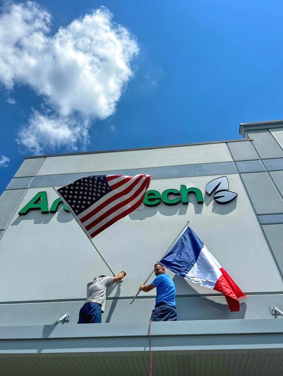 French and American flags at Aromatech USA Orlando site